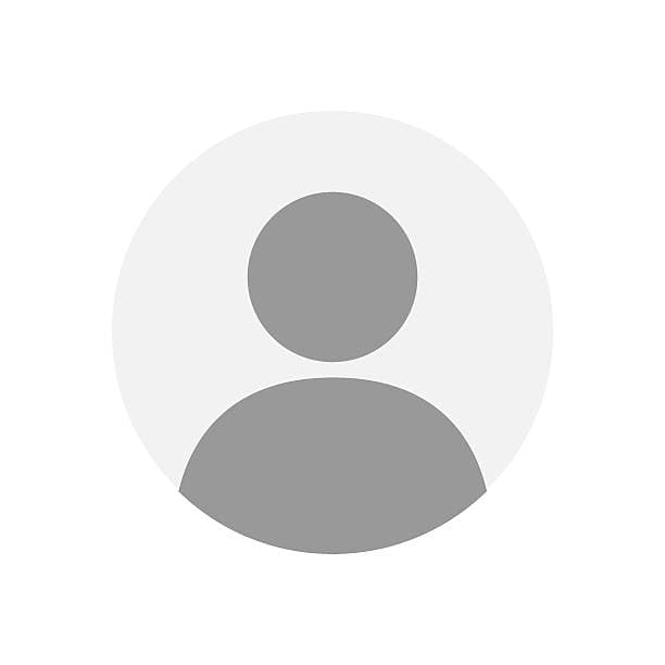 Grey silhouette of a person's head and shoulders inside a light grey circular frame.